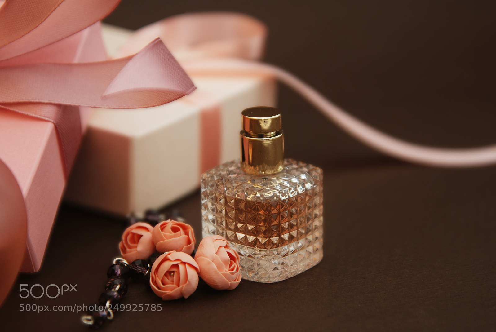 Nikon D80 sample photo. Women's pink perfume in photography