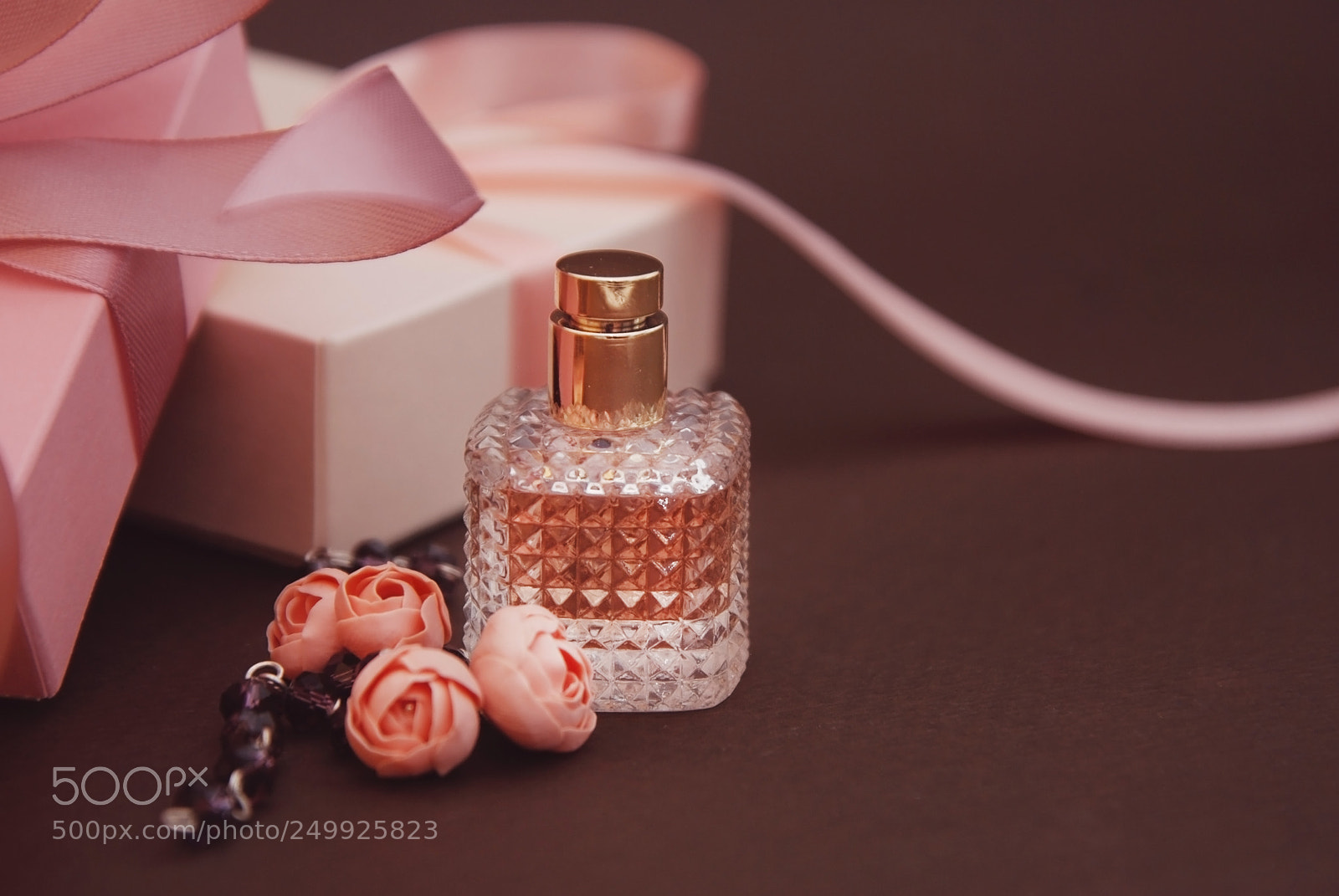 Nikon D80 sample photo. Women's pink perfume in photography