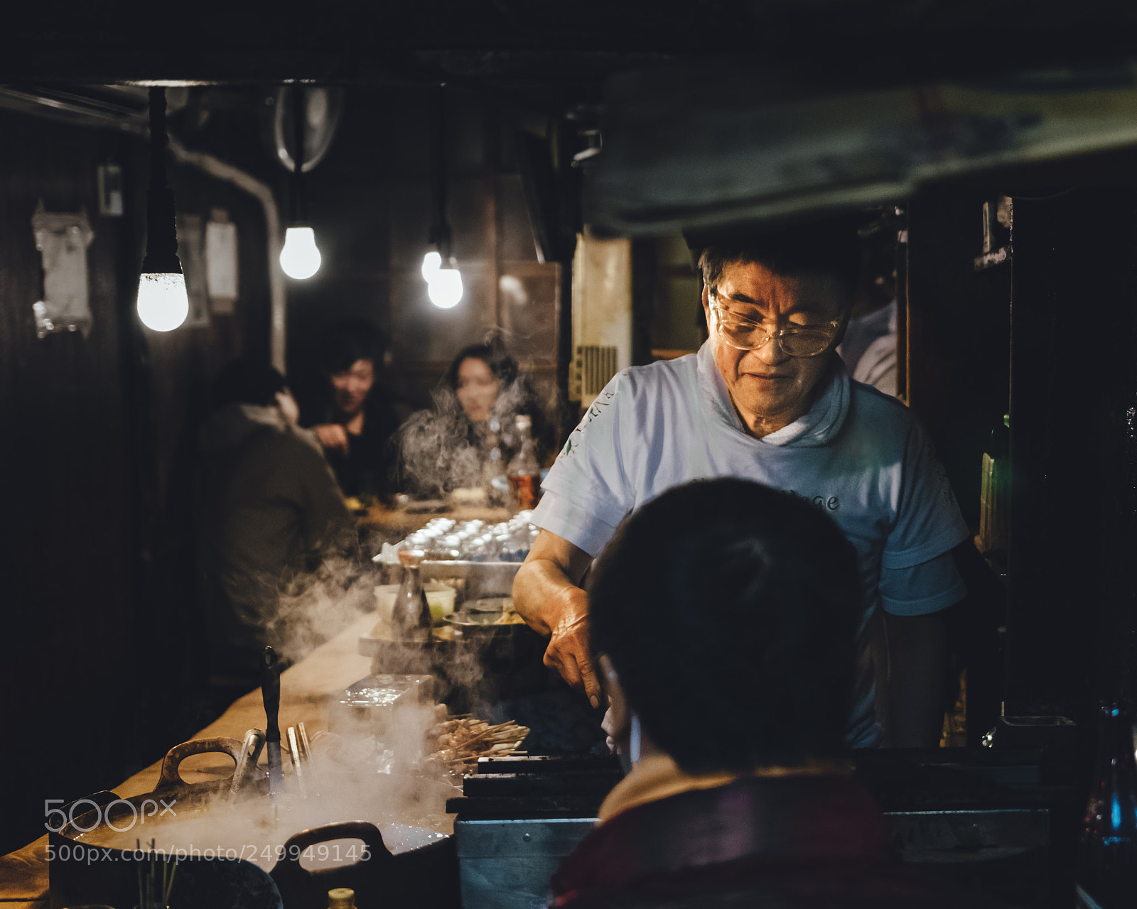 Nikon D5300 sample photo. Man cooking in shinjuku photography
