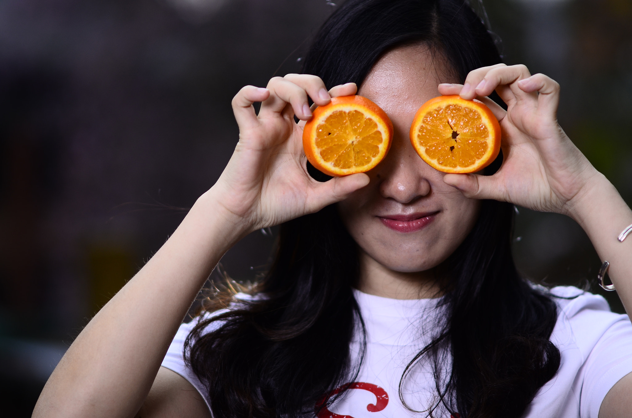 Nikon D7000 + Nikon AF-S Nikkor 85mm F1.8G sample photo. Orange  girl photography