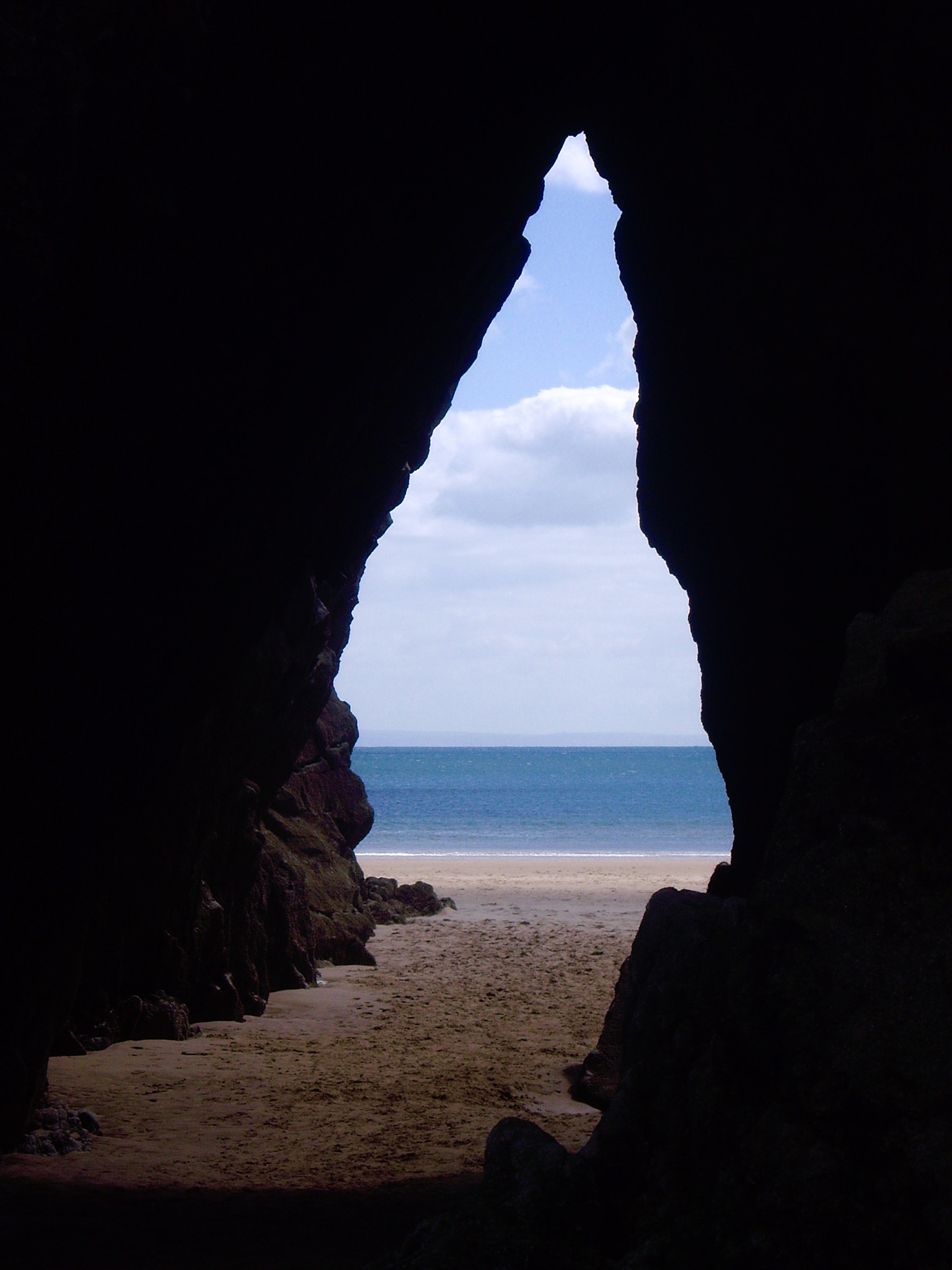 Pentax OPTIO S6 sample photo. Cave by the beach photography