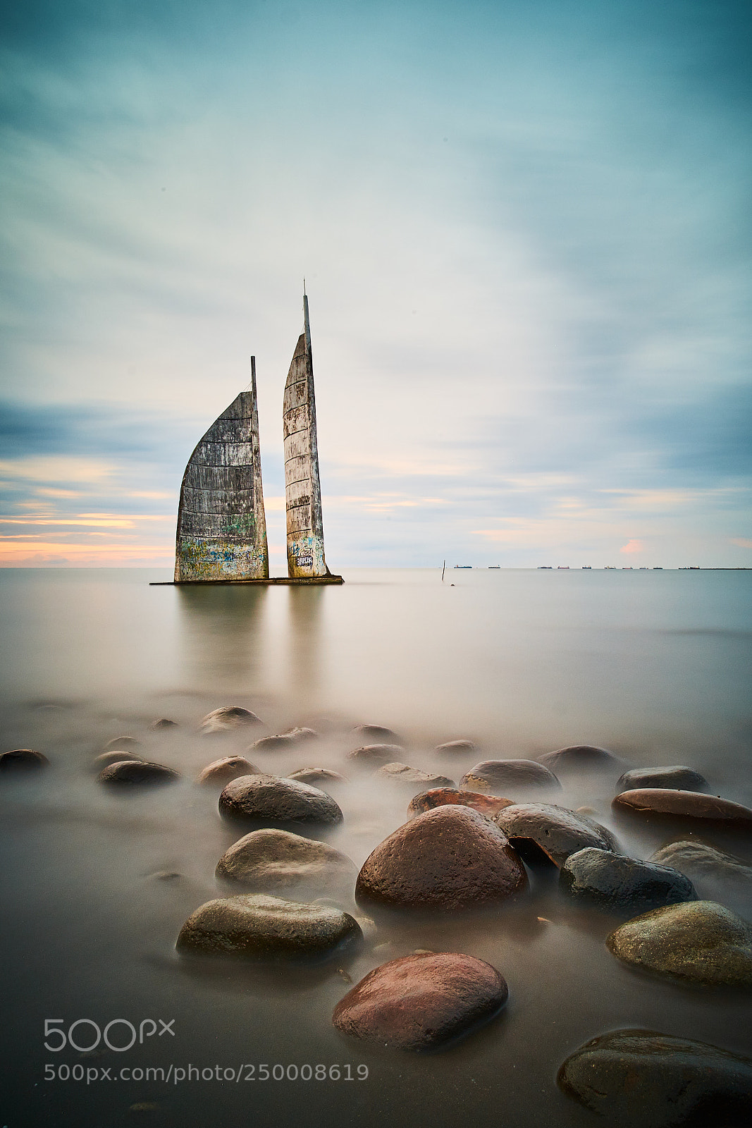 Fujifilm X-Pro1 sample photo. Rocks on a beach photography