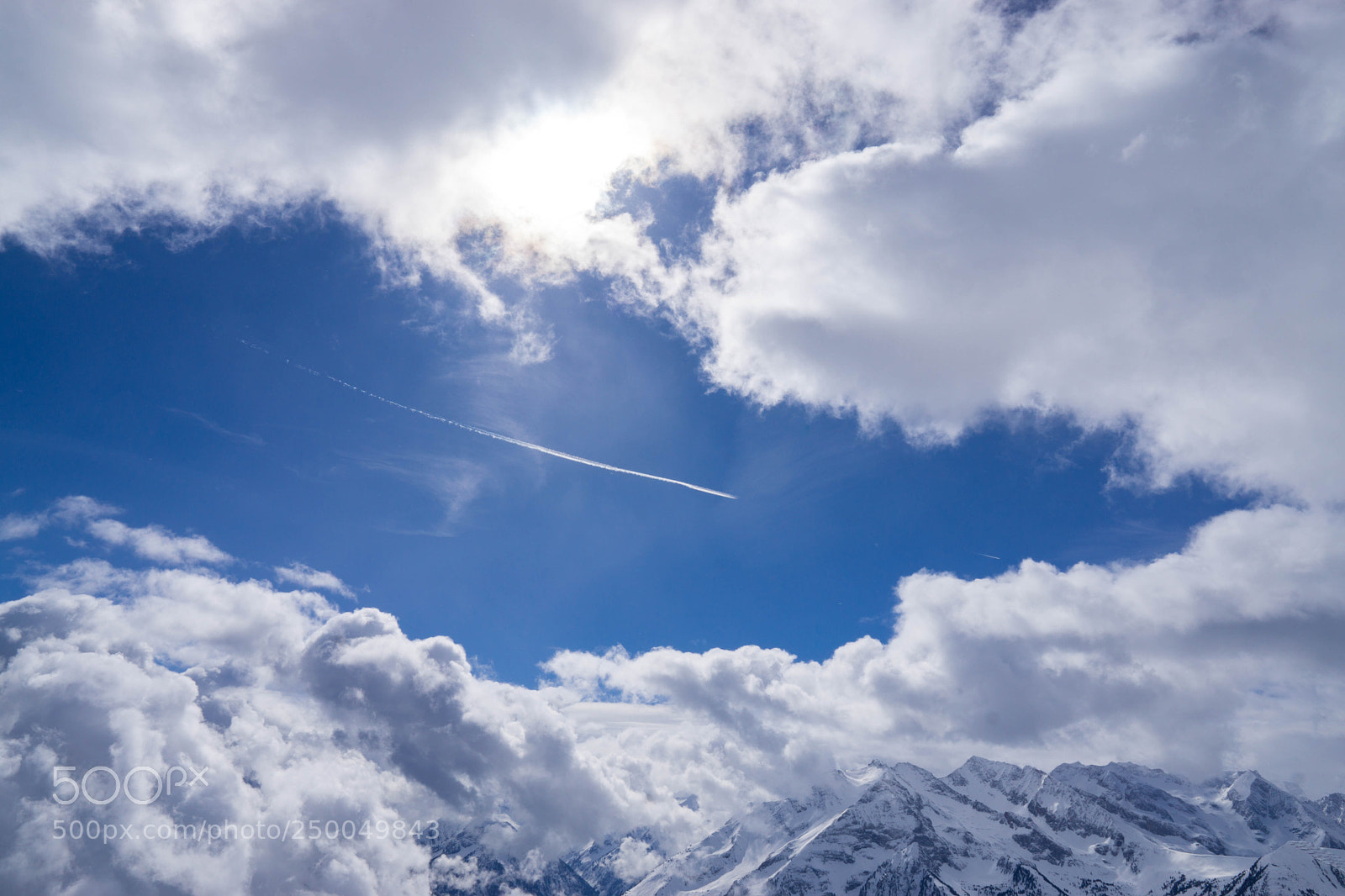 Sony a6000 sample photo. Contrails between clouds photography