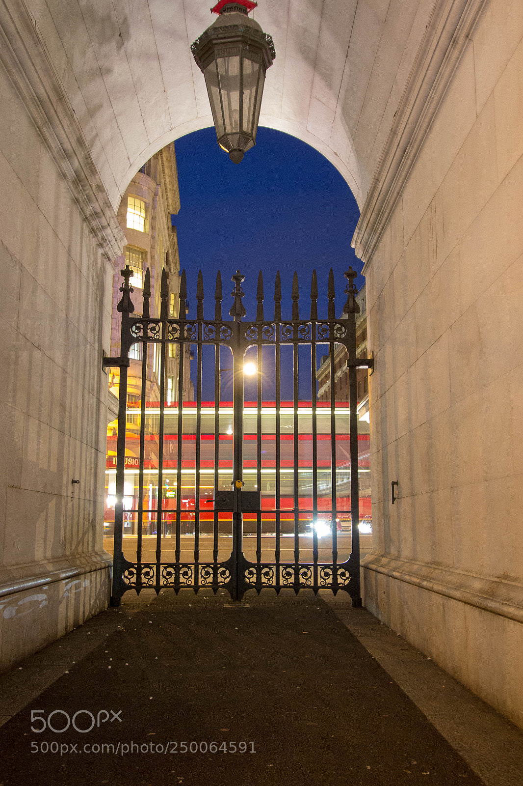 Canon EOS 600D (Rebel EOS T3i / EOS Kiss X5) sample photo. Red bus in jail photography