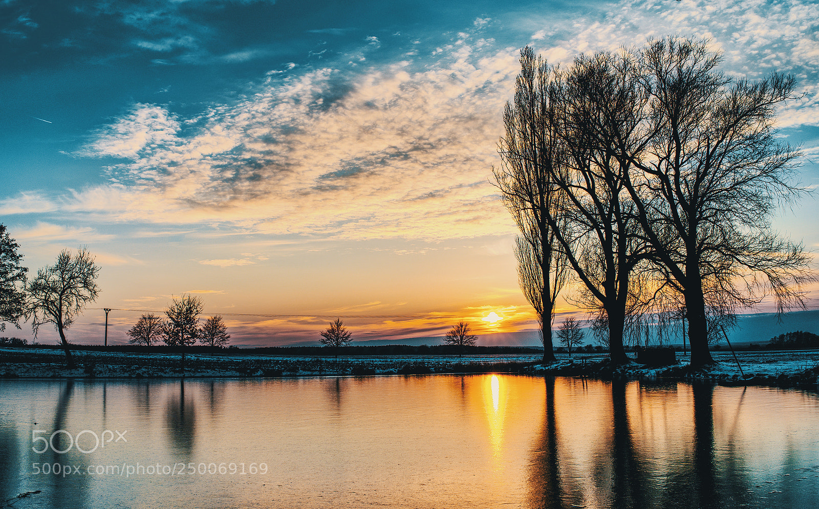 Sony a7 III sample photo. Sunset behind the pond photography