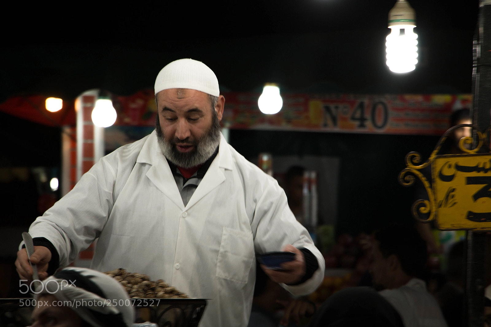Canon EOS 70D sample photo. Man selling nuts photography
