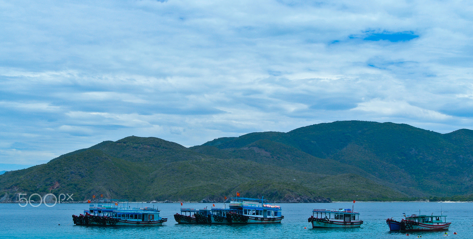 Nikon 1 J1 sample photo. Some boats on the sea photography