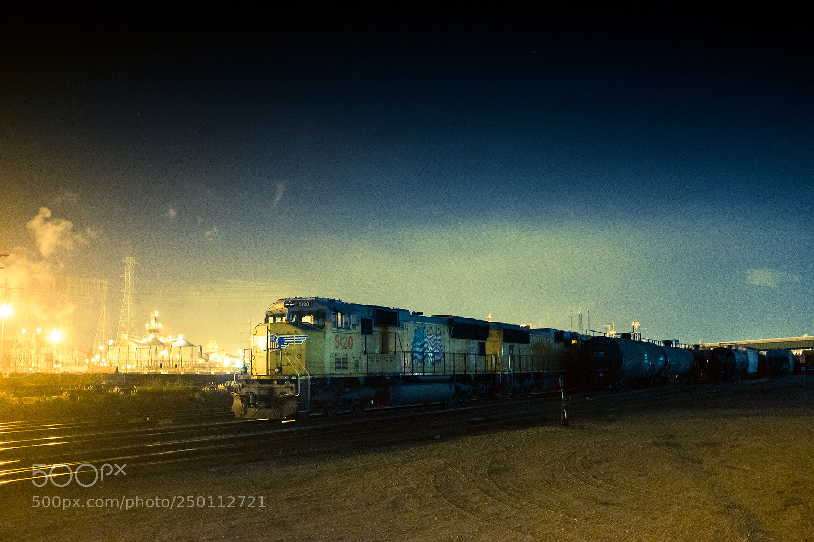 Fujifilm X100S sample photo. Bnsf train at night photography