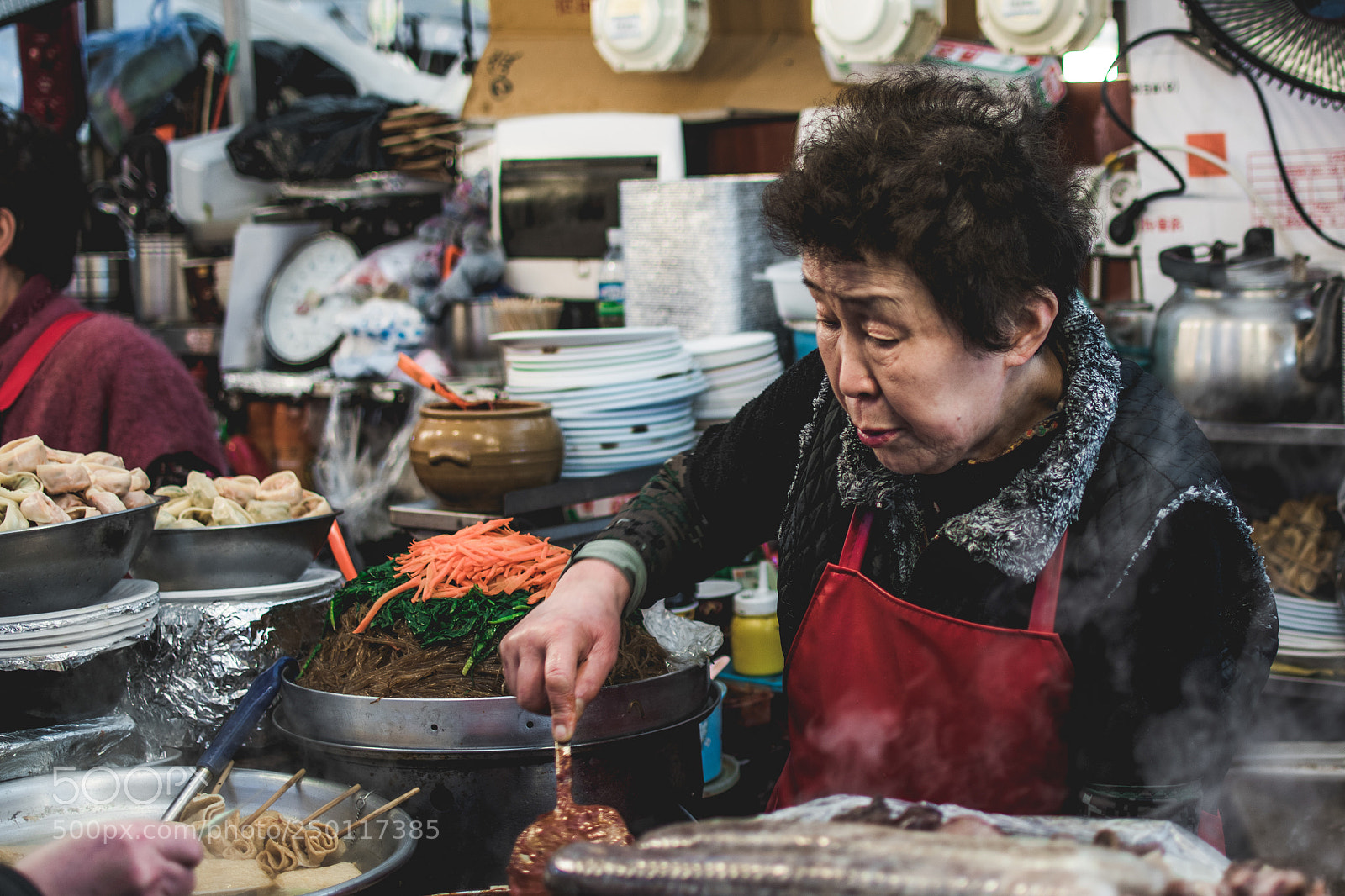 Nikon D5600 sample photo. Elder lady cooking photography