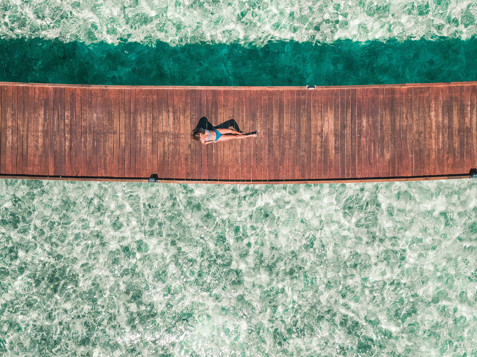 DJI FC220 sample photo. Woman in bikini laying photography