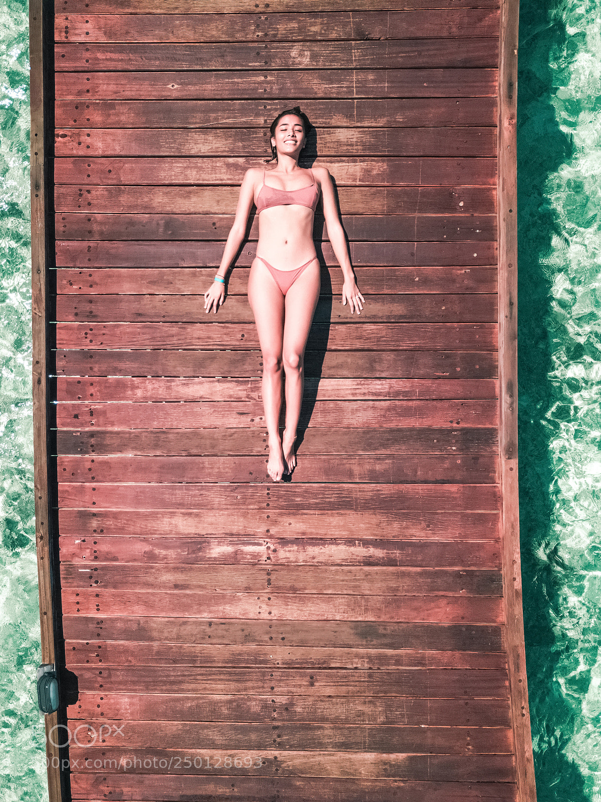DJI FC220 sample photo. Woman in bikini laying photography
