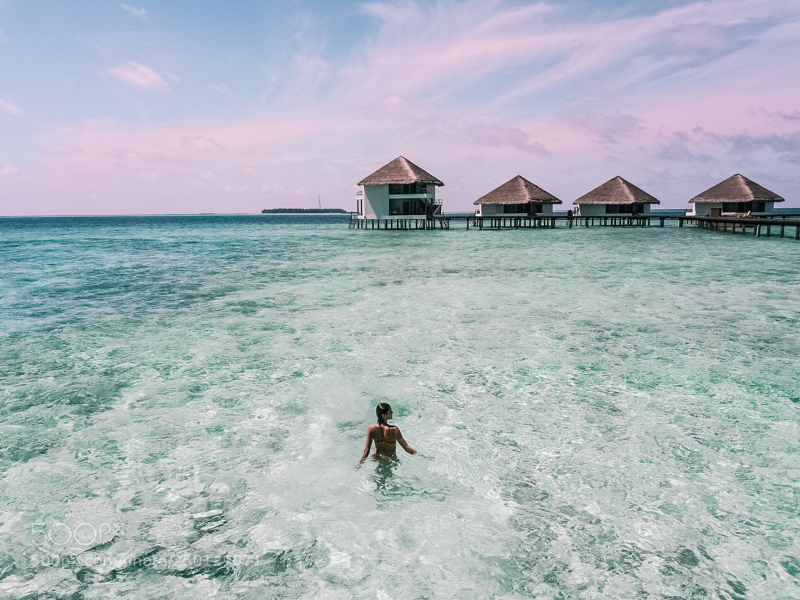 DJI FC220 sample photo. Woman in bikini standing photography