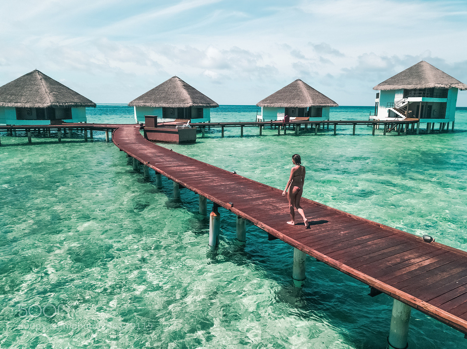 DJI FC220 sample photo. Woman in bikini walking photography