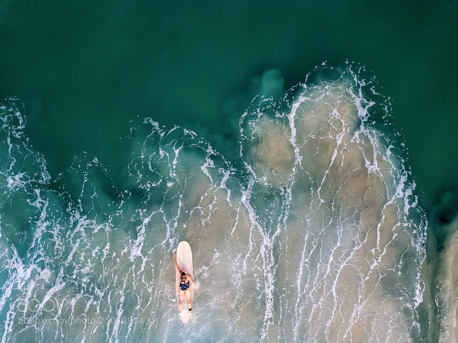 DJI FC220 sample photo. Woman surfer paddling photography