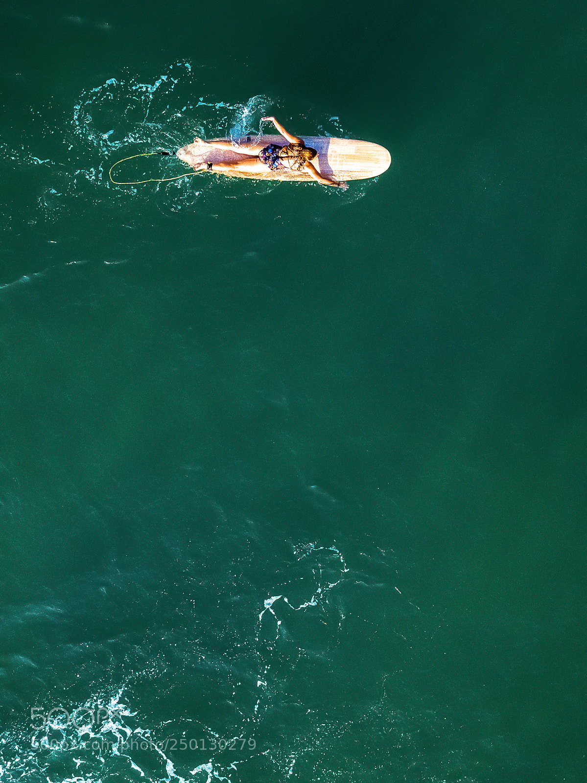 DJI FC220 sample photo. Female surfer paddling alone photography