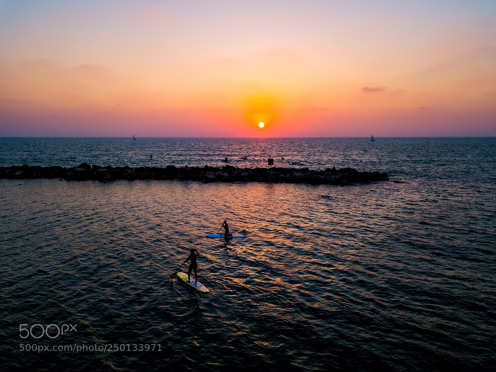 DJI FC220 sample photo. Sup surfers paddling photography
