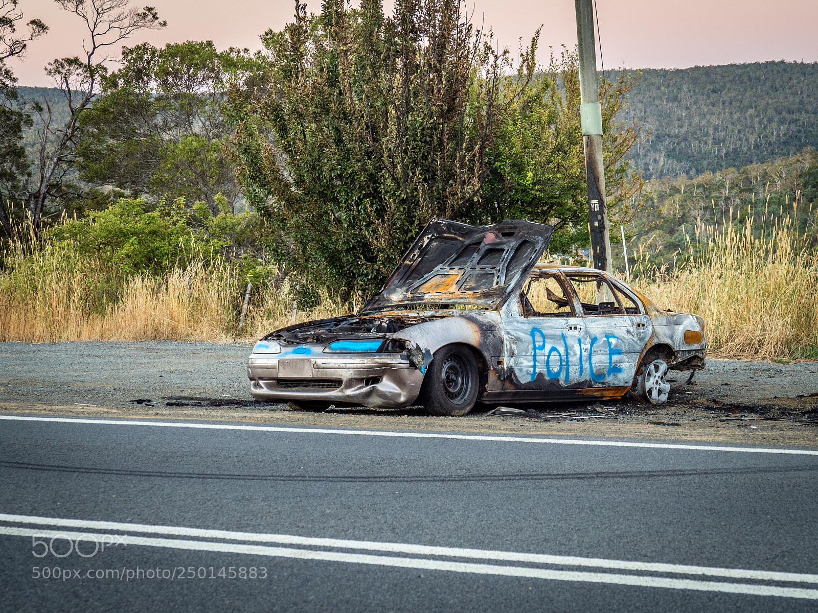 Olympus OM-D E-M5 II sample photo. Burnt car photography