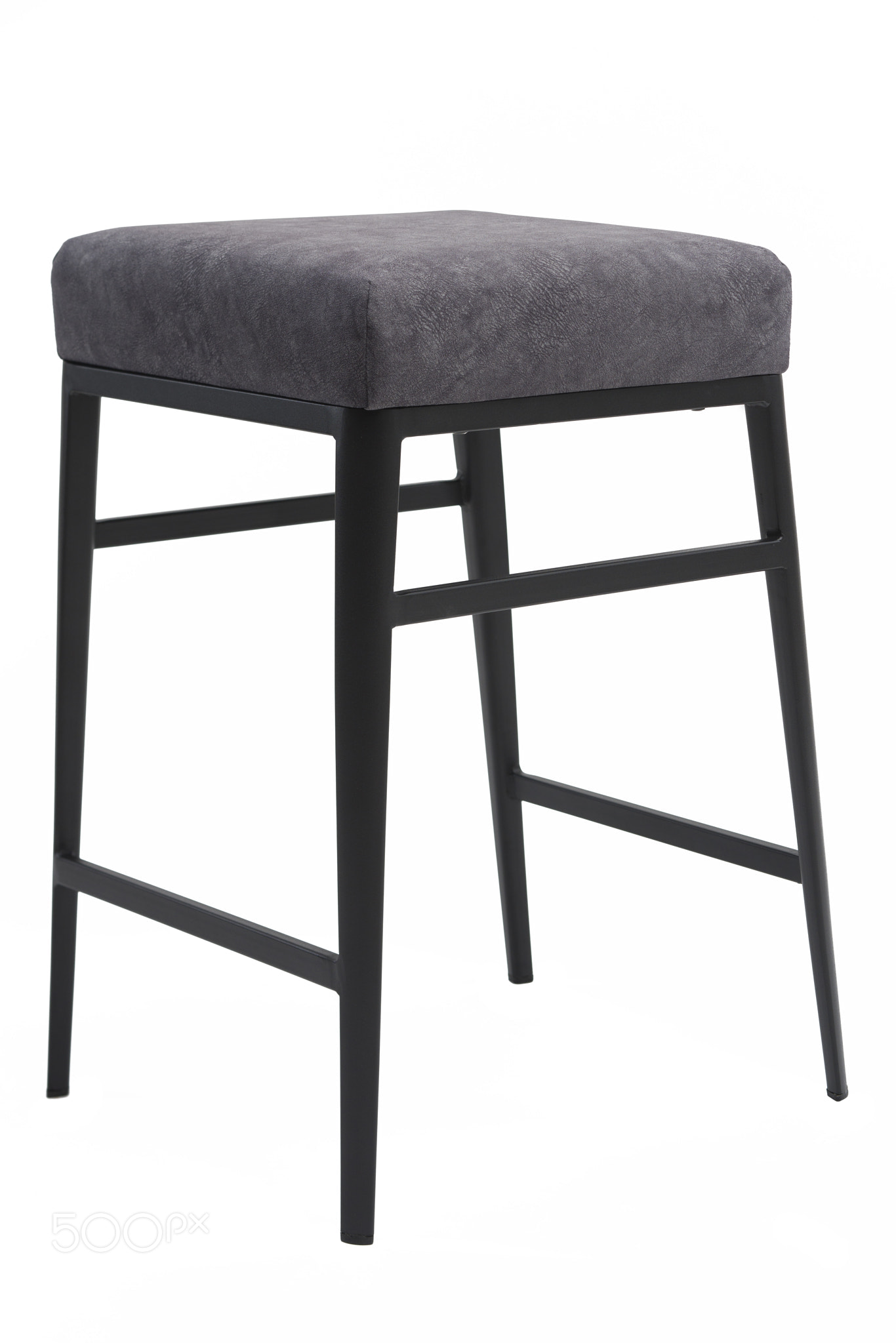 Gray color stool. Modern designer stool on white background. Textile stool.