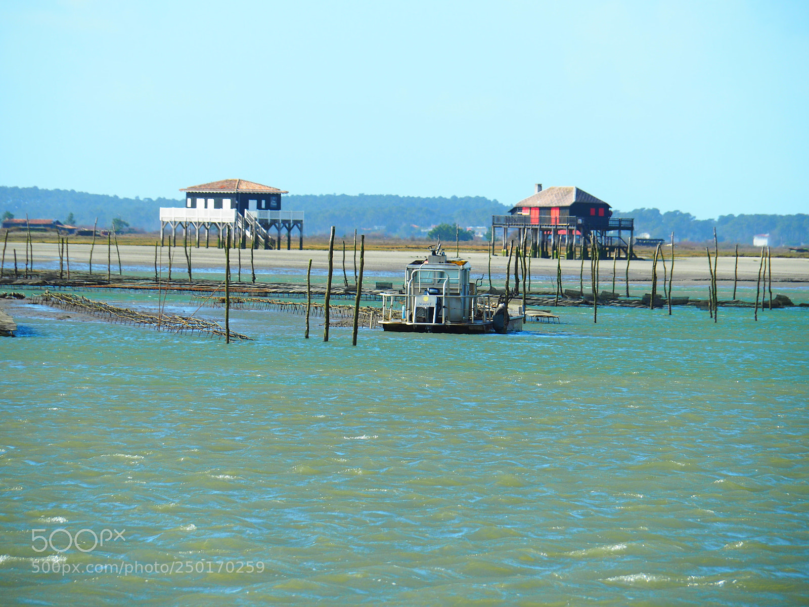 Olympus OM-D E-M5 II sample photo. Houses built on piles photography