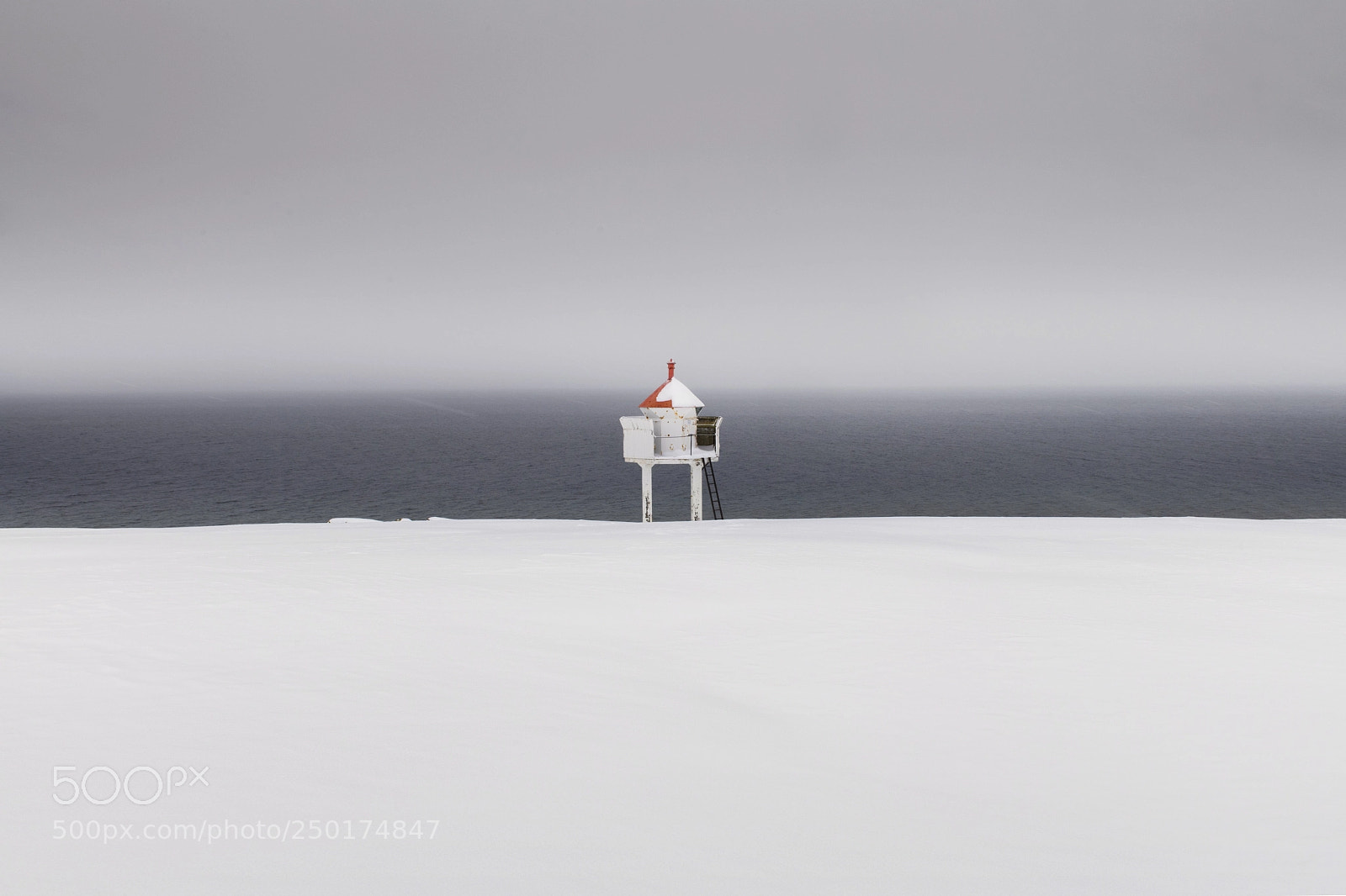 Nikon D850 sample photo. Lighthouse in snowy weather photography
