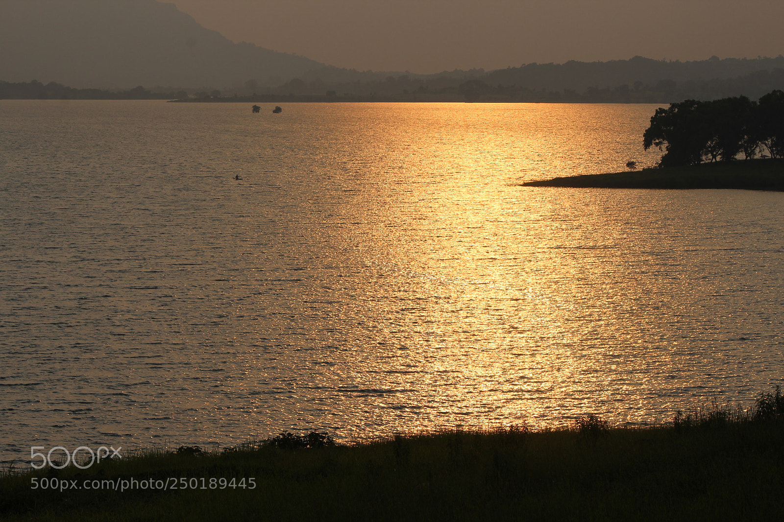 Canon EF-S 55-250mm F4-5.6 IS II sample photo. Boating during sunset photography