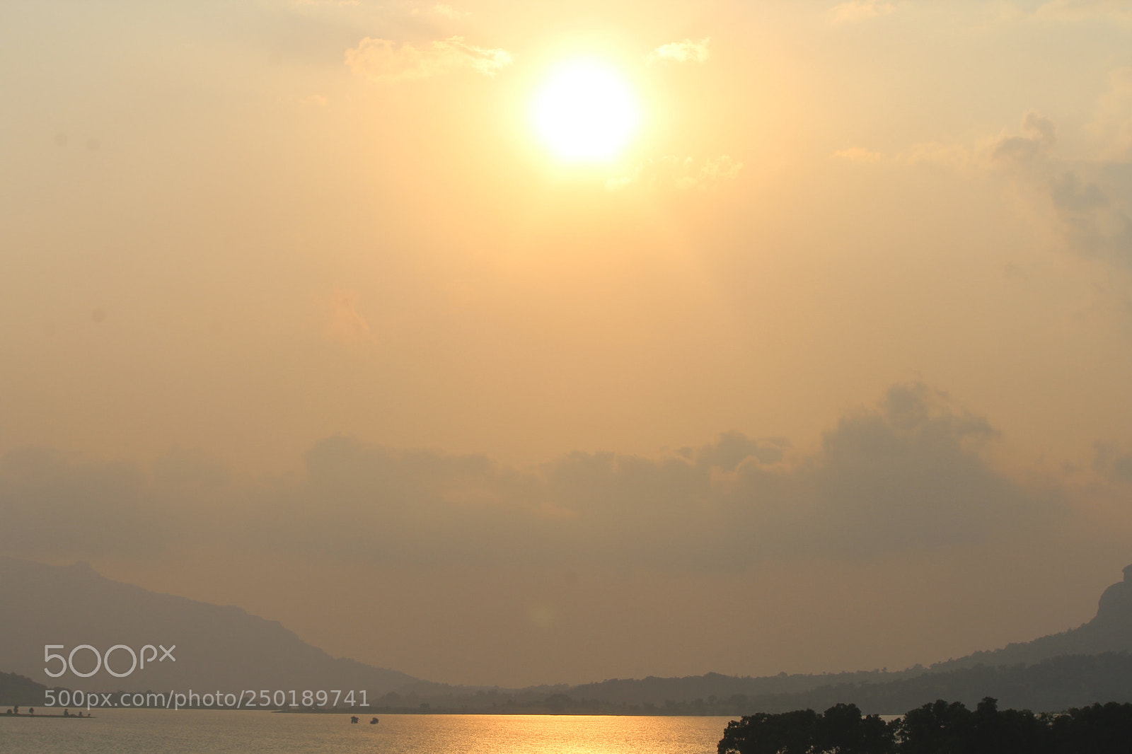 Canon EF-S 55-250mm F4-5.6 IS II sample photo. Shades of orange during photography