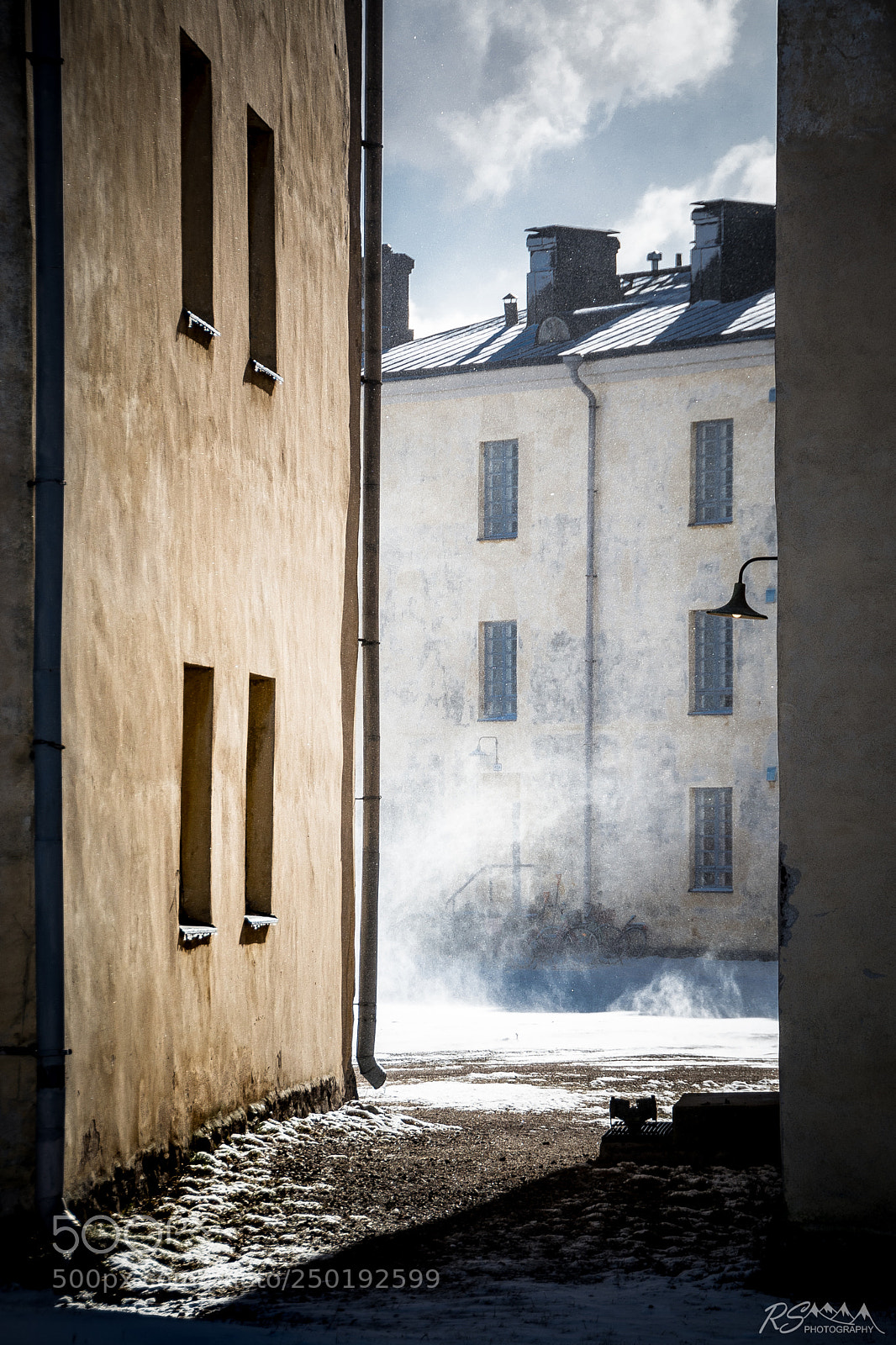 Nikon D5200 sample photo. Snowdrift between barracks photography
