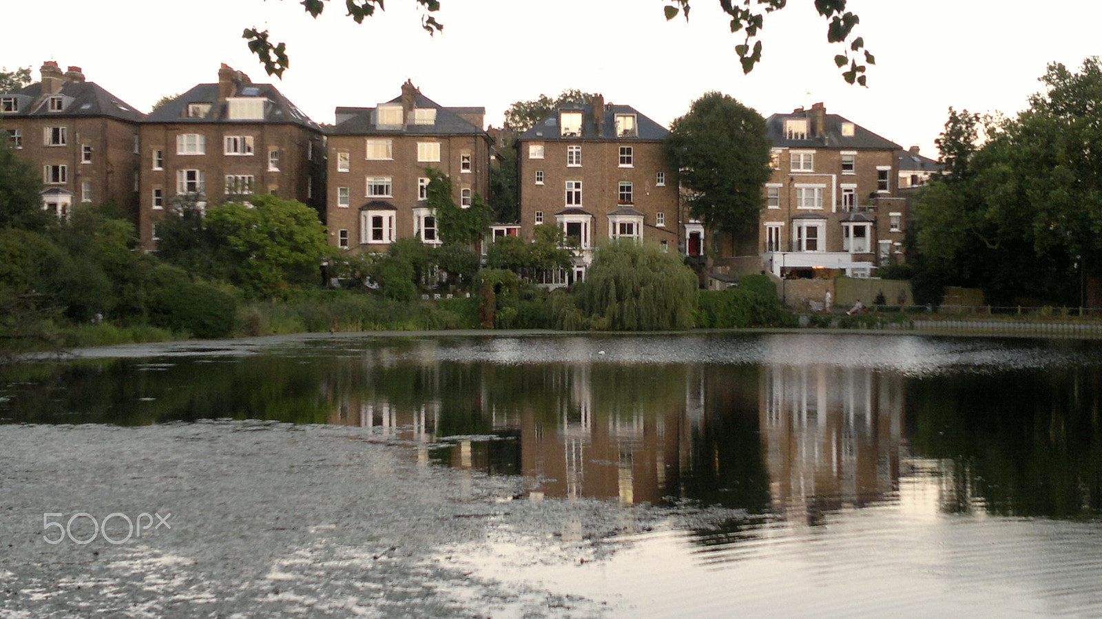 Nokia N8-00 sample photo. Houses on riverbank photography
