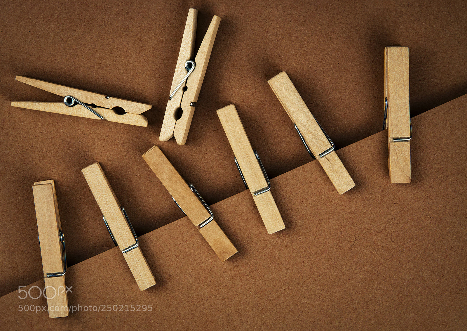Nikon D5500 sample photo. Wooden pins on brown photography