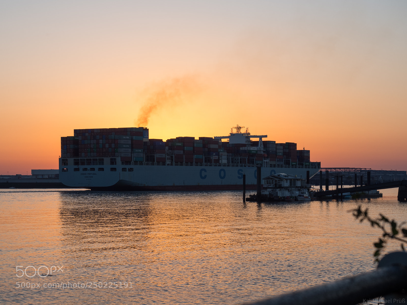Olympus OM-D E-M10 II sample photo. Sunset freighter photography