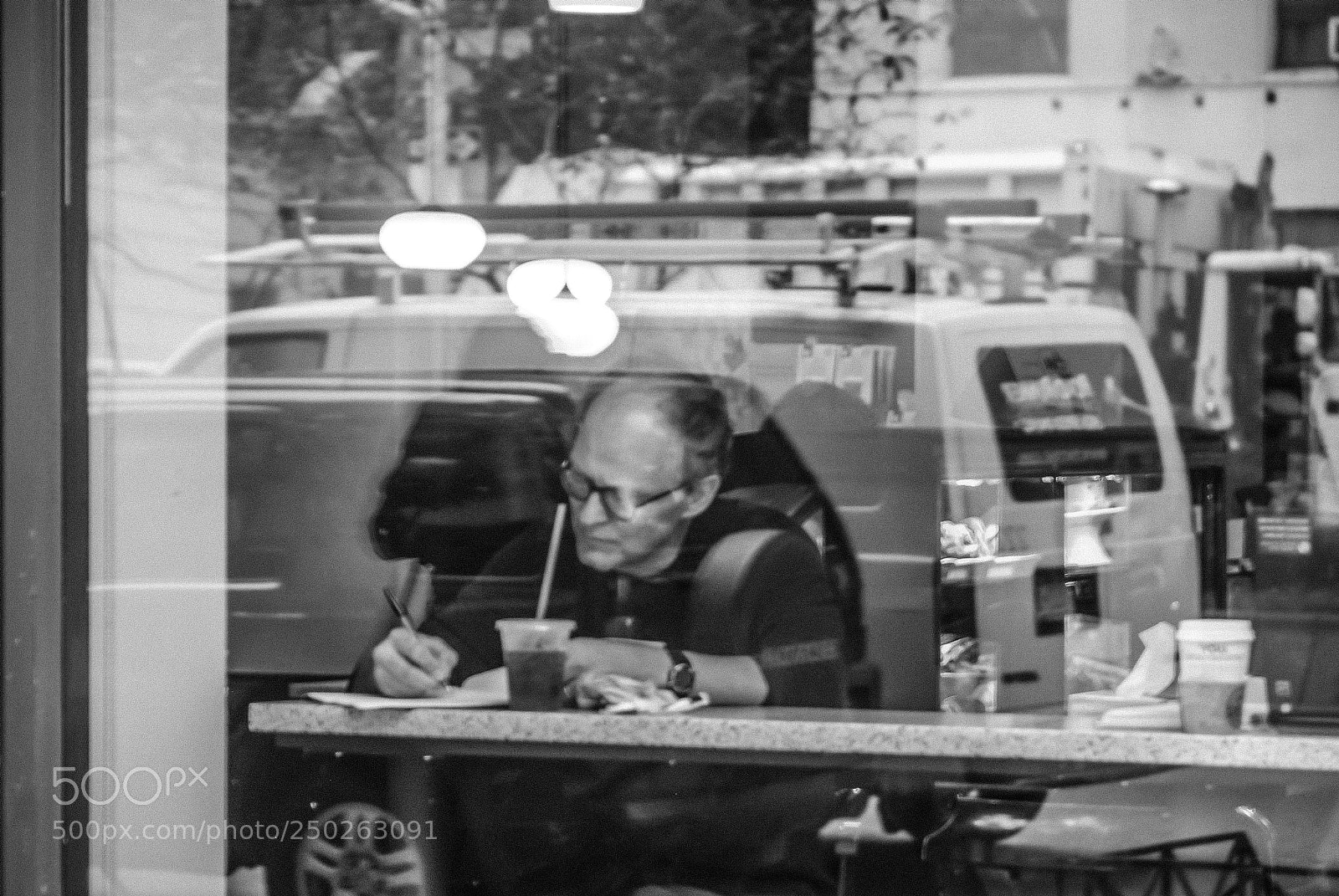 Nikon D80 sample photo. Starbucks writer photography