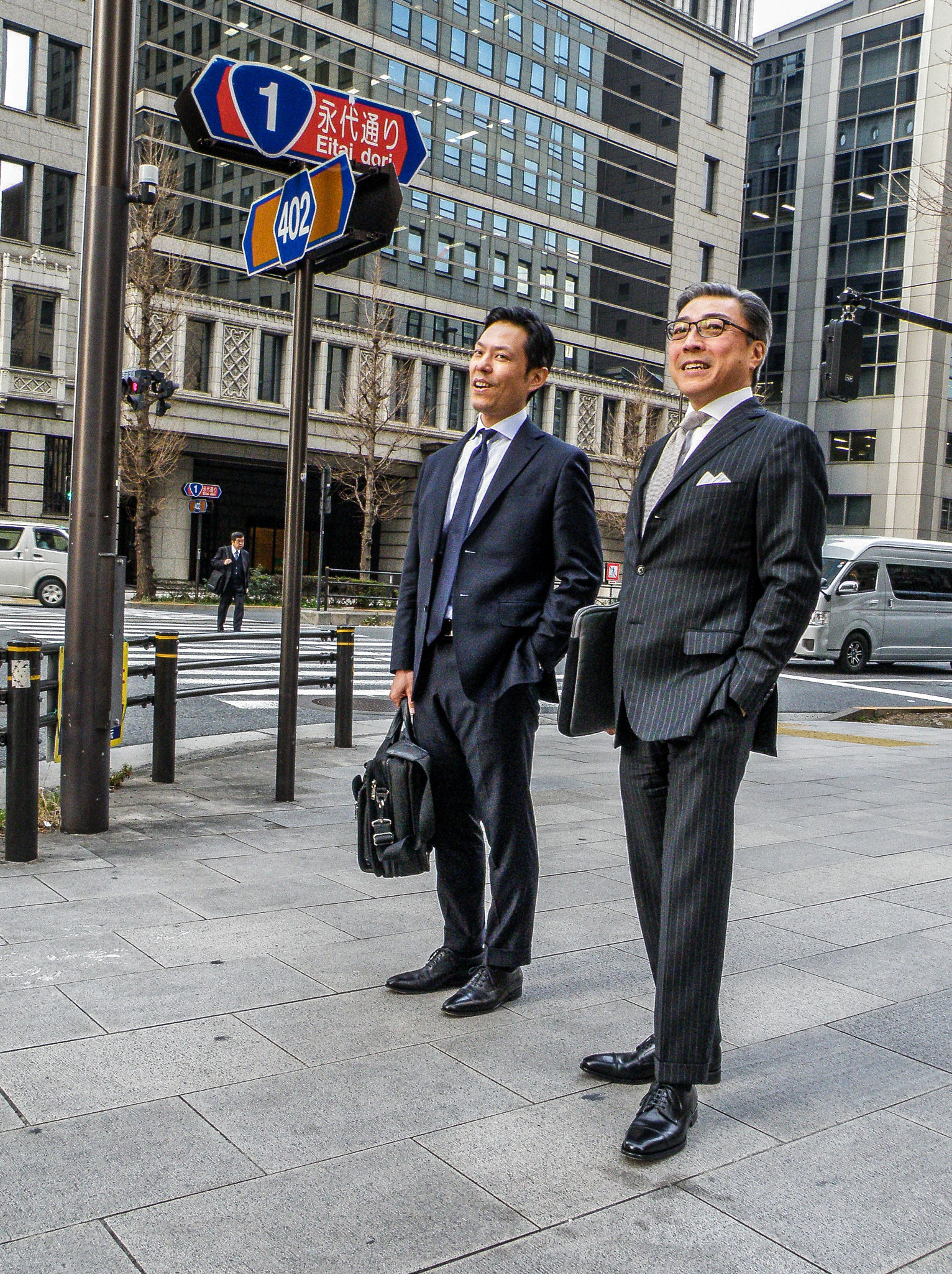 Olympus SP570UZ sample photo. A businessman in tokyo photography