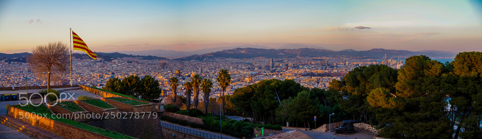 Pentax K-S2 sample photo. Panormanic barcelona with flag photography