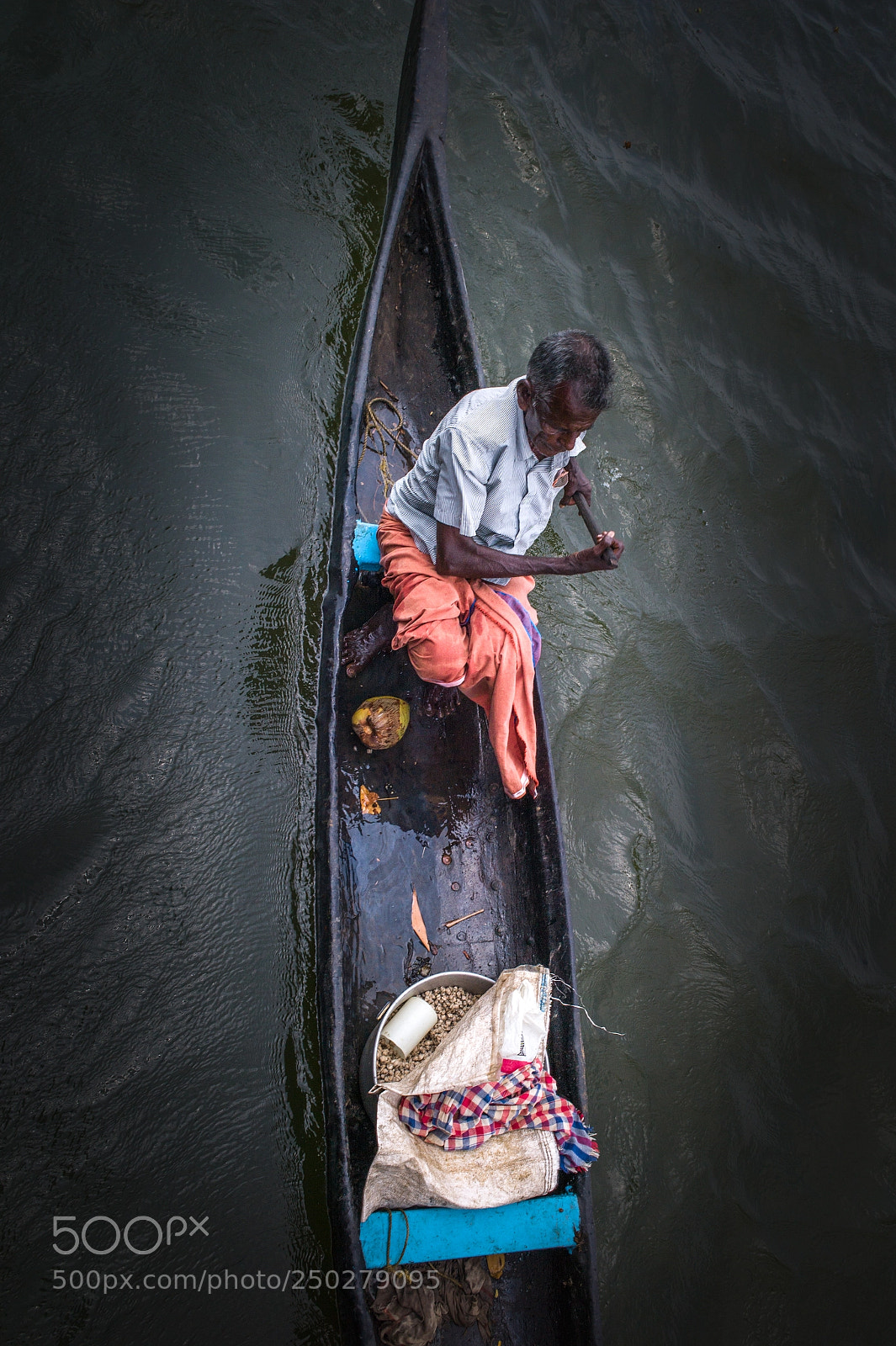 Leica M9 sample photo. Canoe man photography