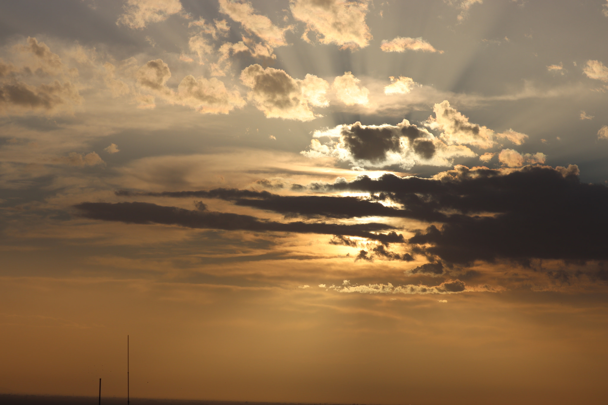 Canon EF-S 55-250mm F4-5.6 IS STM sample photo. Sun and clouds photography