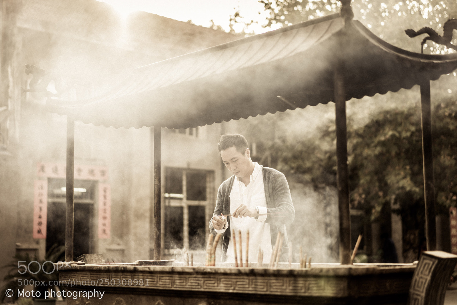 Sony a7R II sample photo. Chinese temple incense male photography