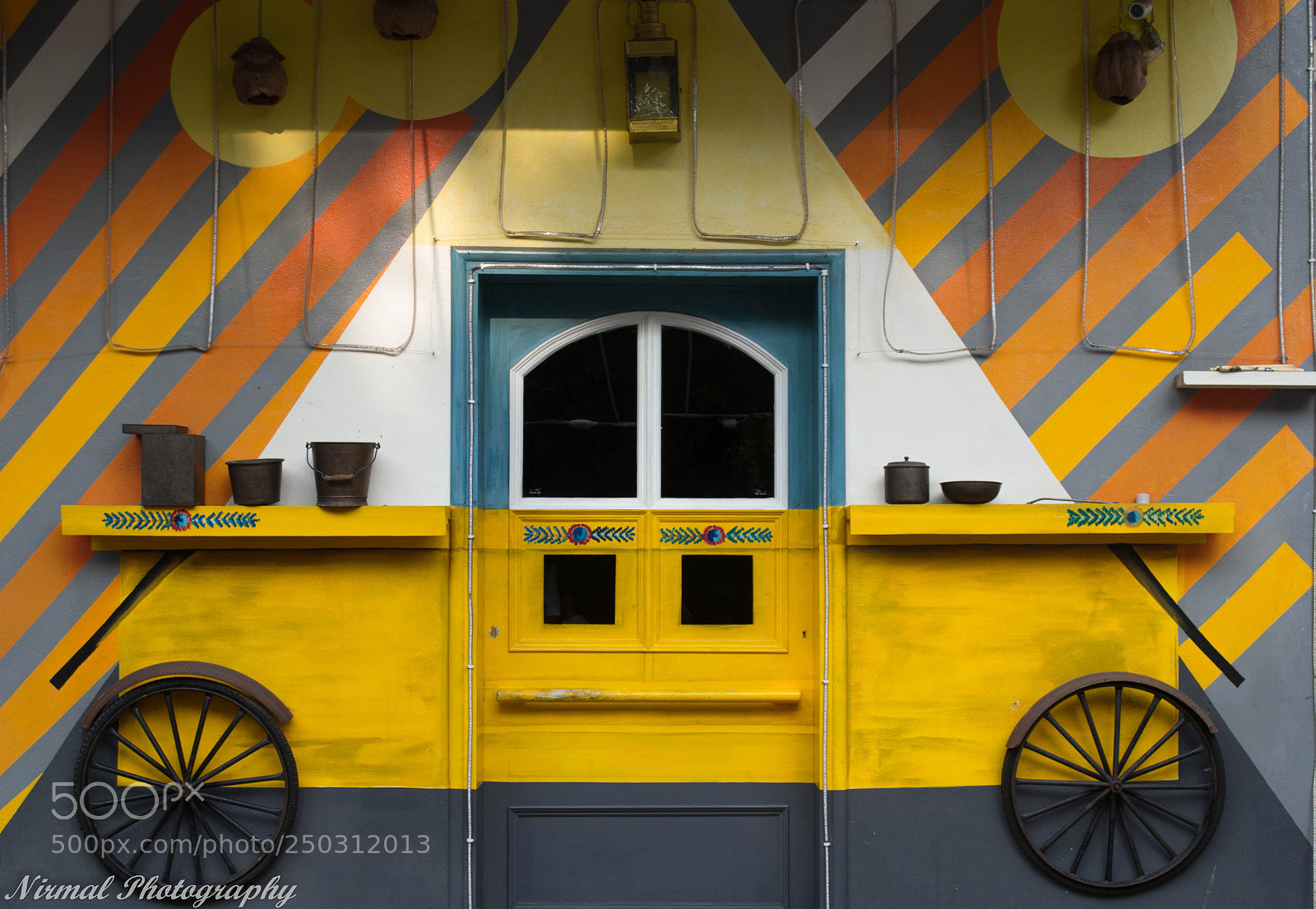 Nikon D3100 sample photo. Push cart on wall photography