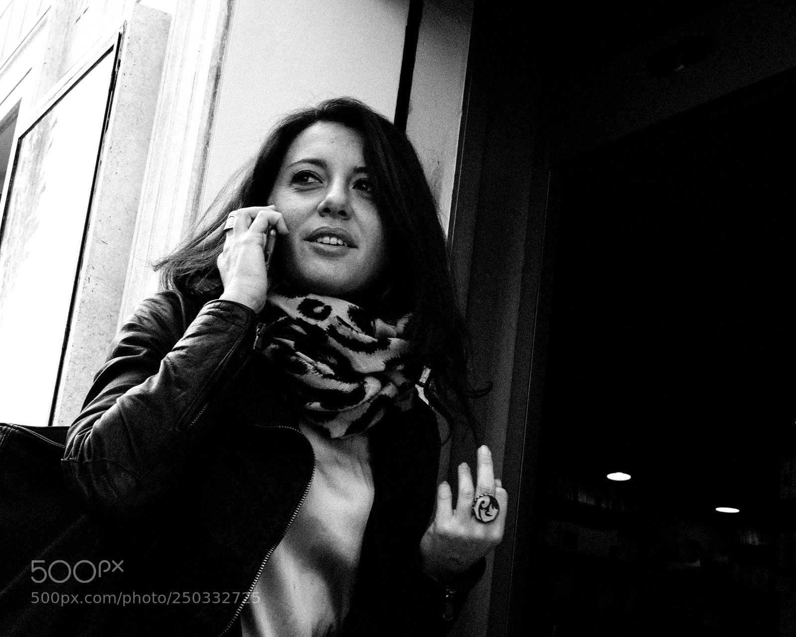 Sony a6500 sample photo. Woman on cellphone gestering photography