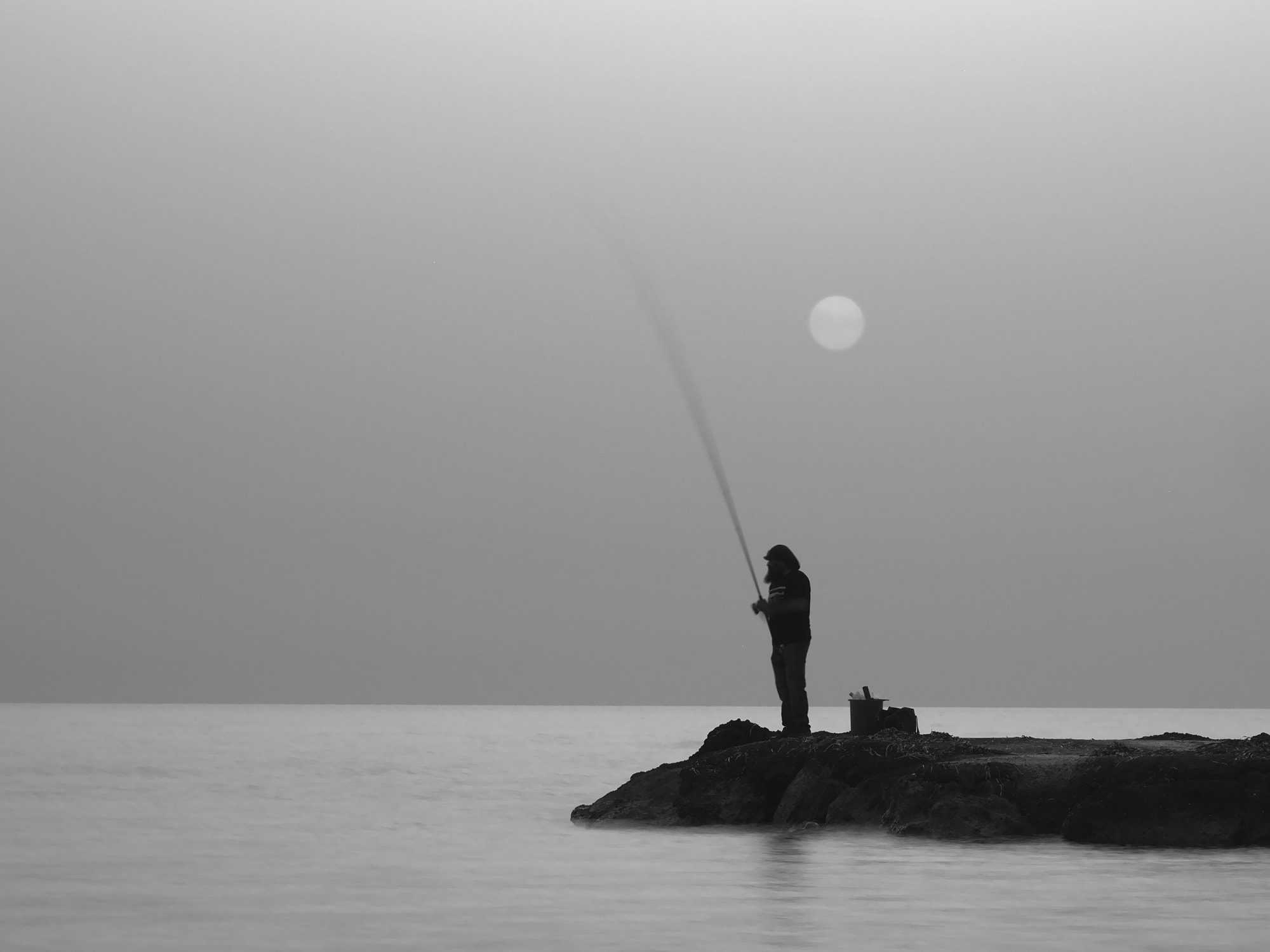 Olympus PEN E-PM2 sample photo. Fishing bw photography