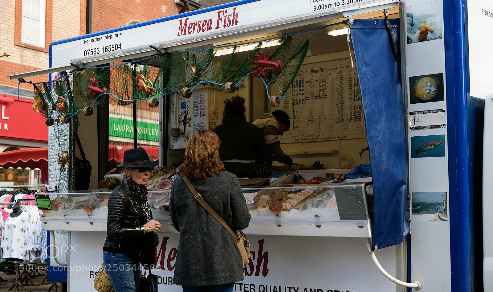 Panasonic Lumix DMC-GX7 sample photo. Colchester fish stall photography