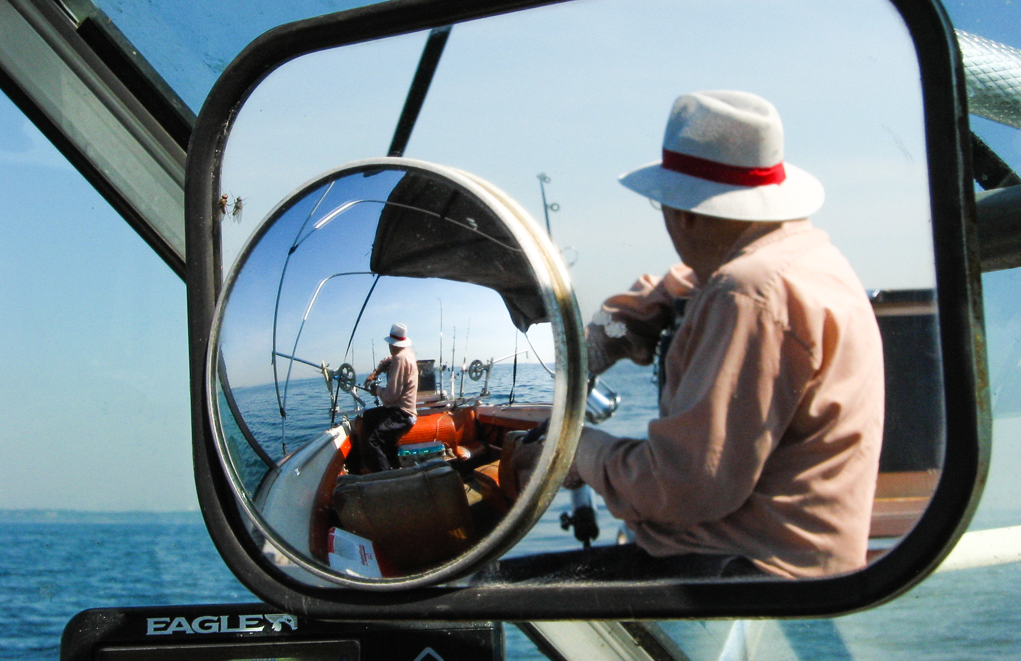 Canon POWERSHOT S30 sample photo. The fisherman on his boat photography