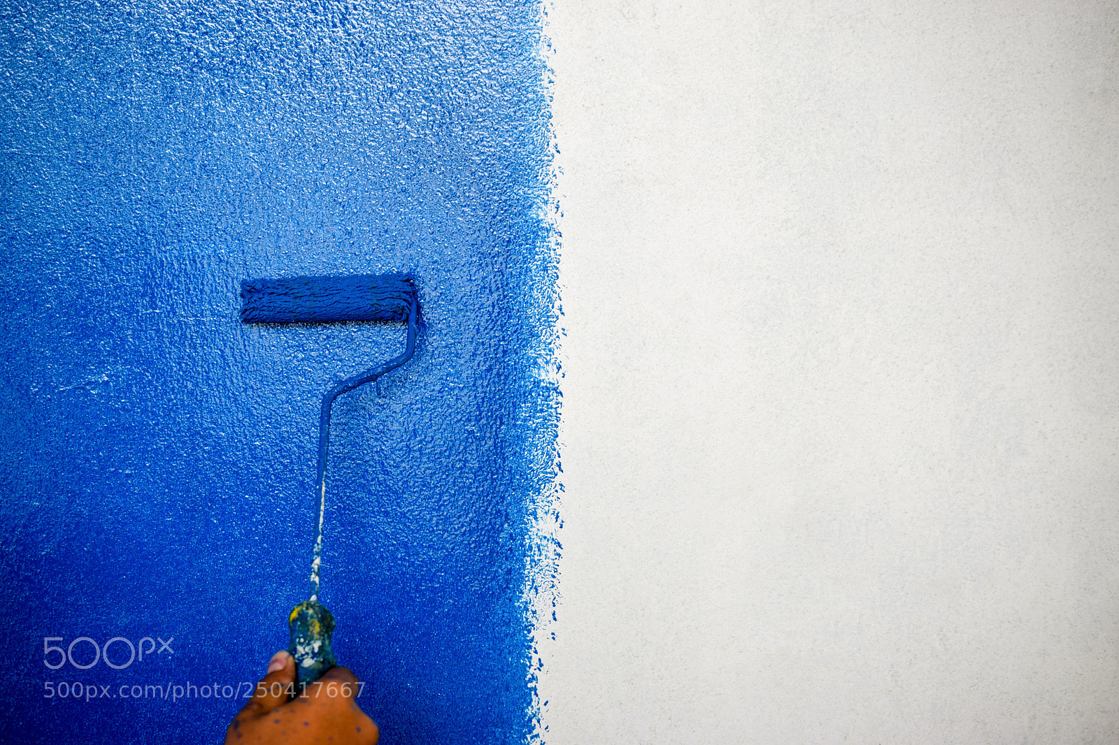 Nikon D5300 sample photo. Male hand painting wall photography