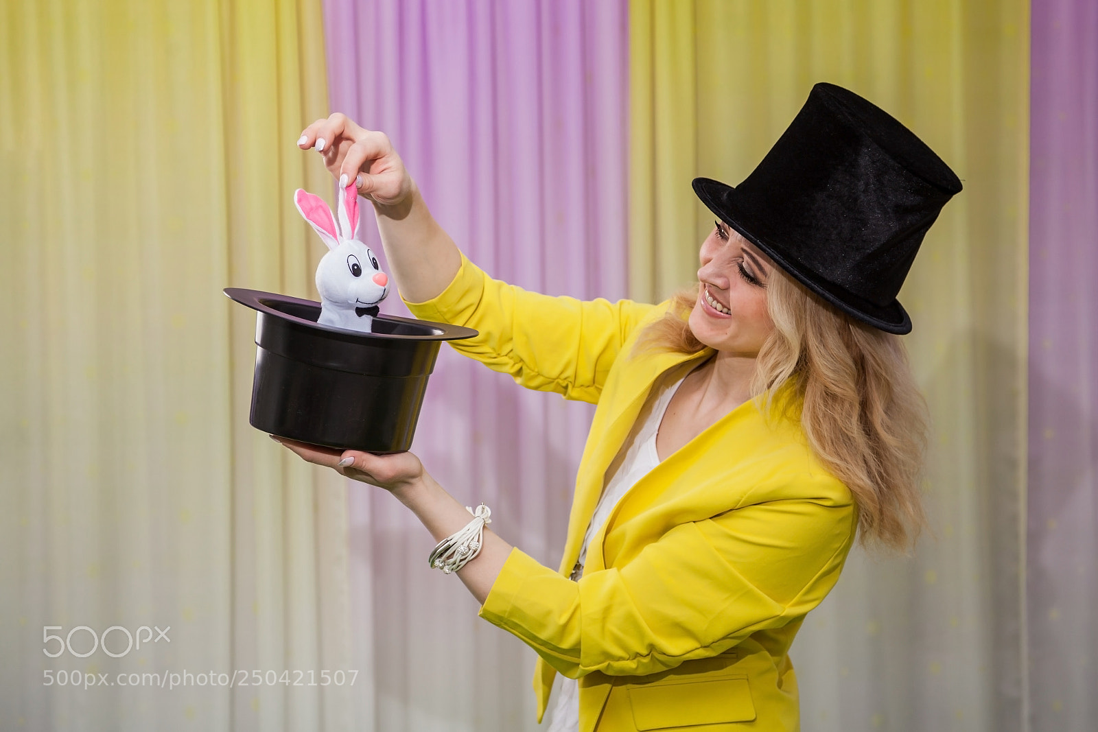 Canon EOS 5D Mark II sample photo. Woman magician shows tricks photography