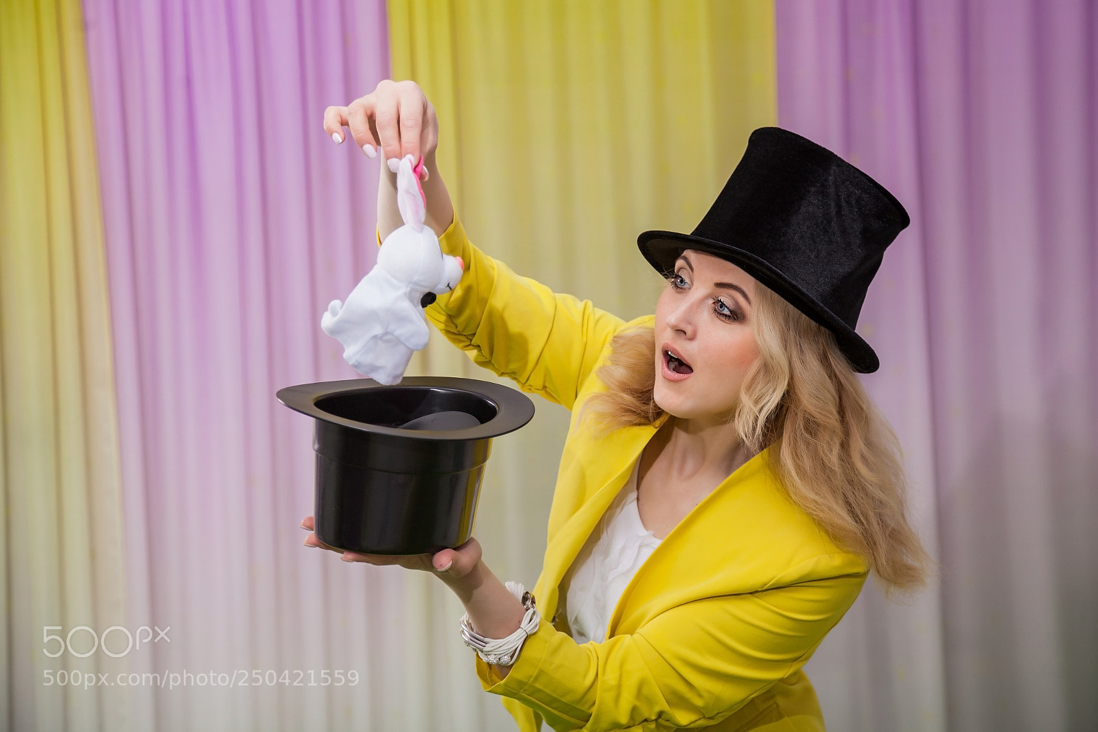Canon EOS 5D Mark II sample photo. Woman magician shows tricks photography