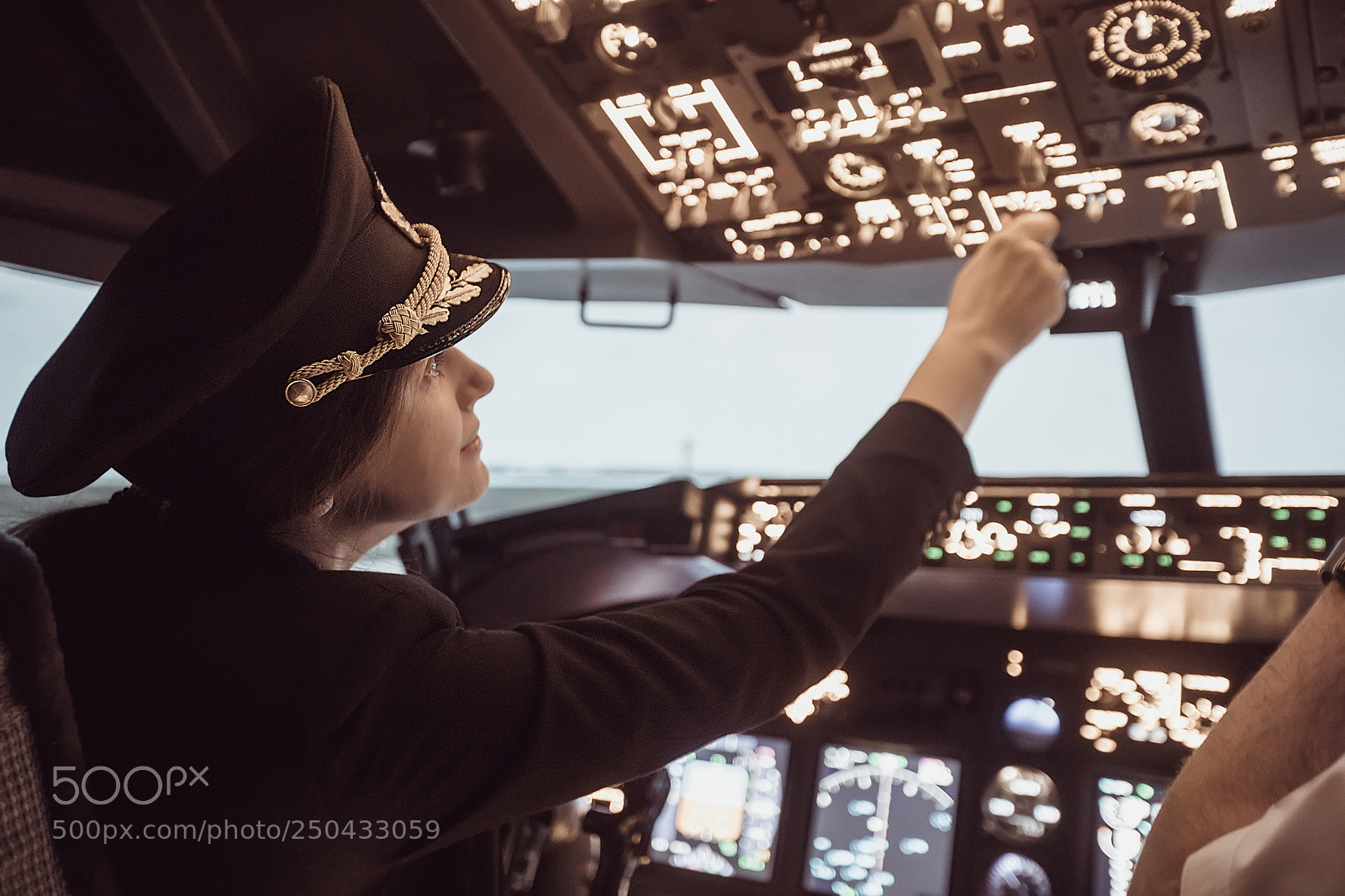 Canon EOS 5D Mark IV sample photo. Female pilot captain prepares photography