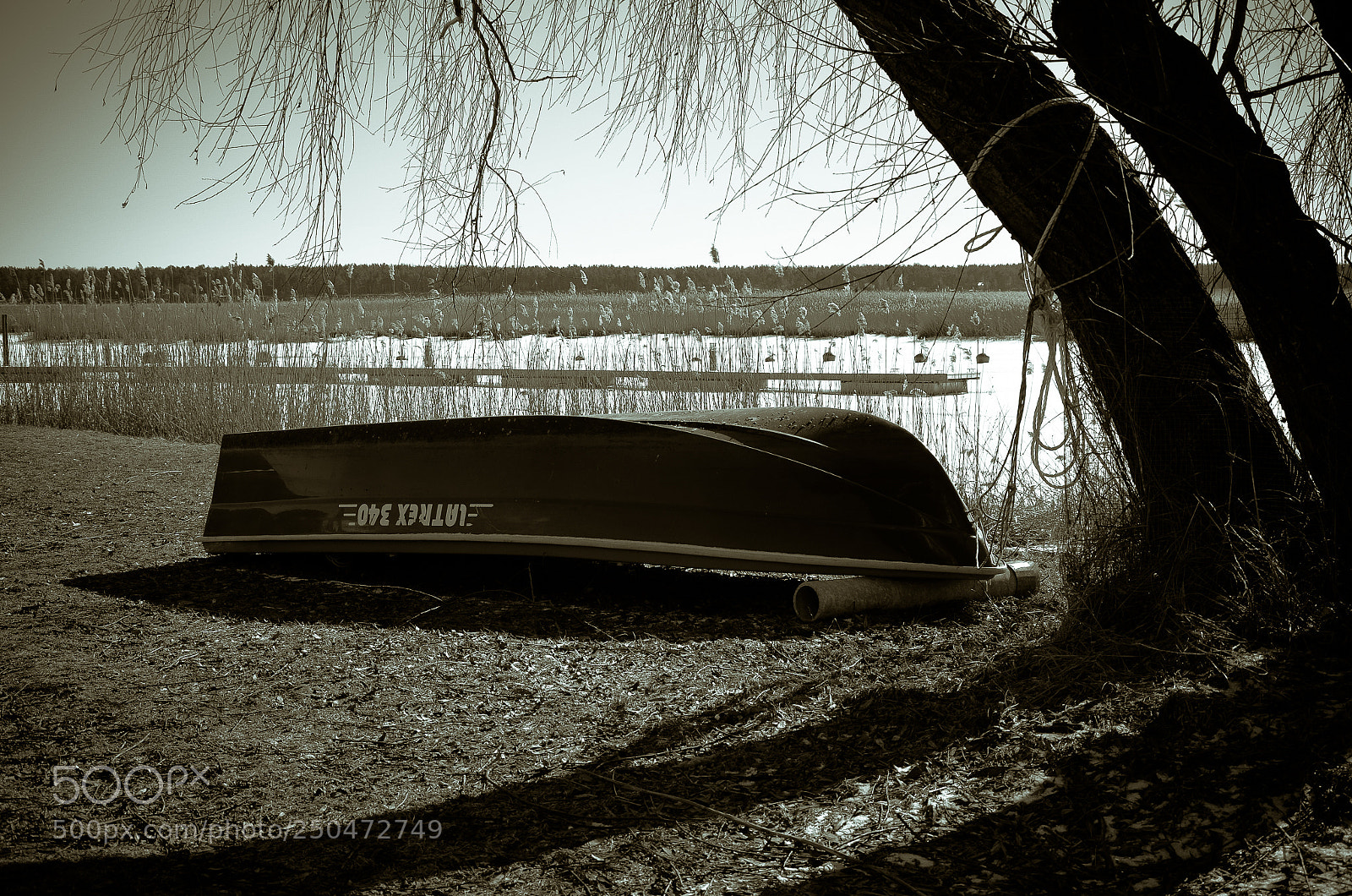 Nikon D5100 sample photo. Lonely boat photography