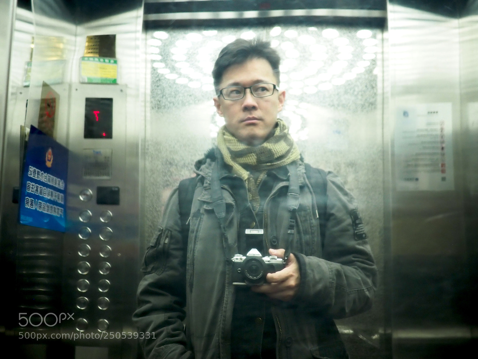 Olympus OM-D E-M5 II sample photo. Suspicious personage photography