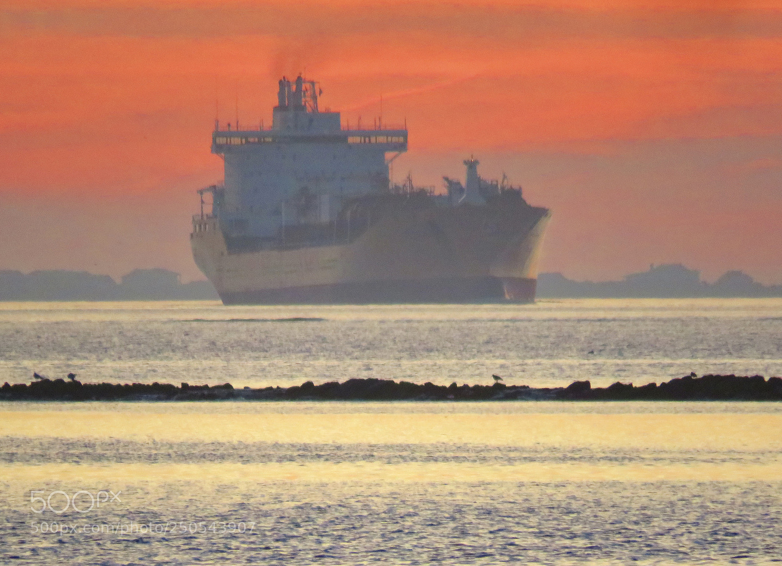 Canon PowerShot SX60 HS sample photo. Freighter entering river photography
