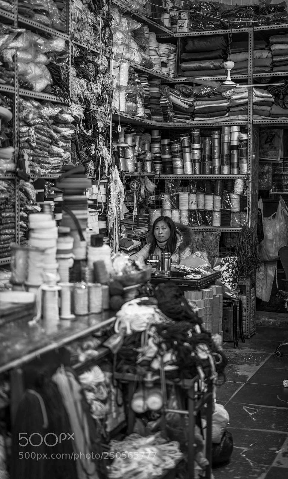 Sony a7 II sample photo. Framed by her shop photography