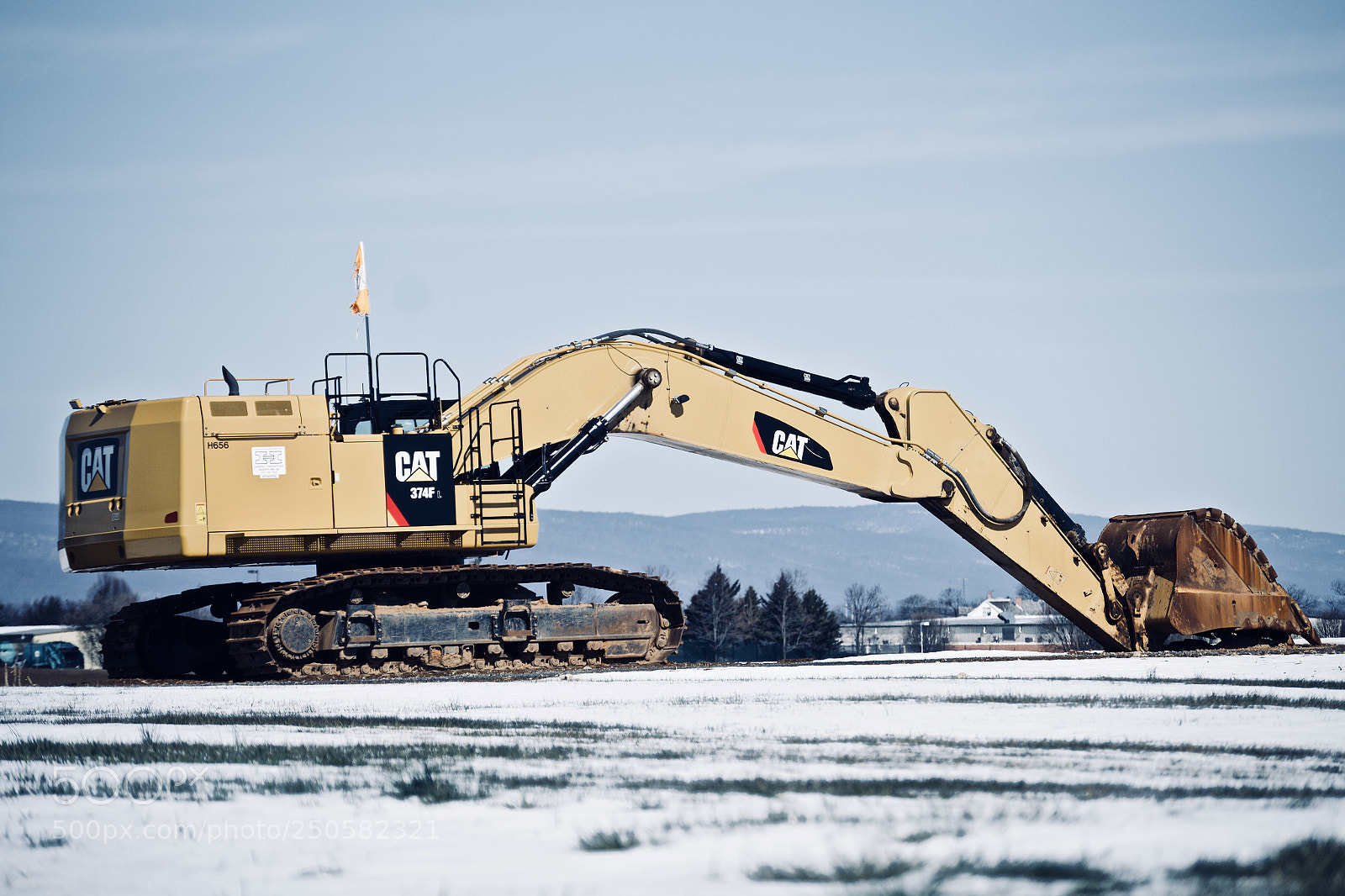 Nikon D3100 sample photo. Mechanical snowfall photography